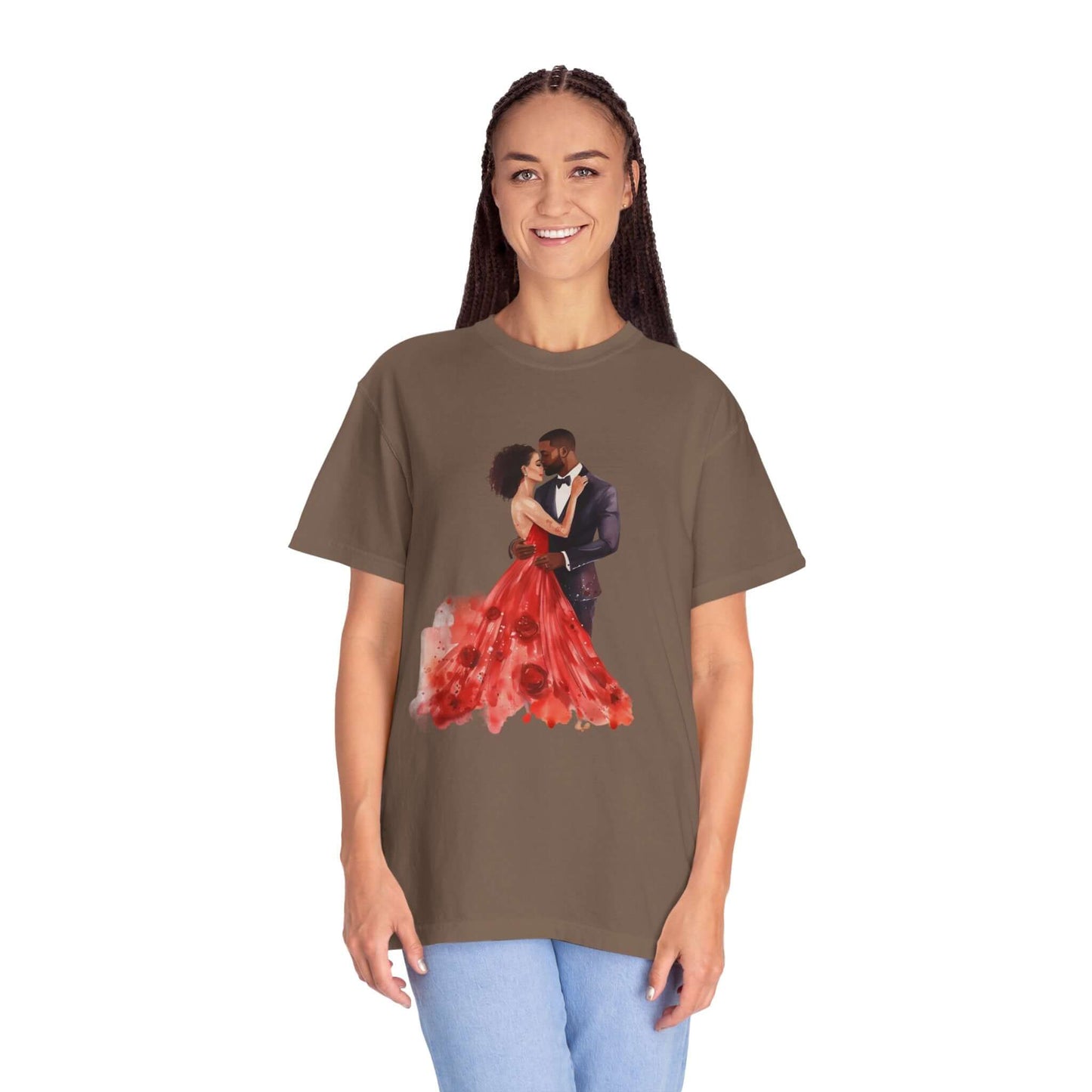 Woman wearing brown t-shirt with couple dancing, red gown print, and blue jeans