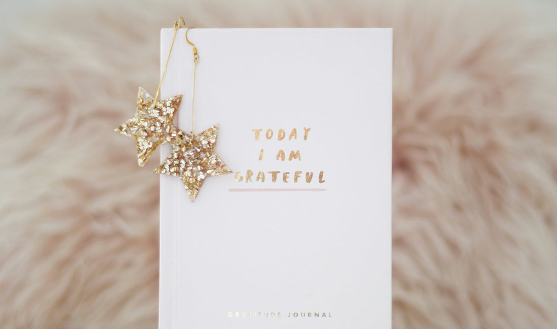 Premium notebook and pen for journaling beginners - self-care journal setup with coffee