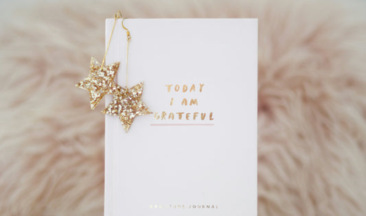 Premium notebook and pen for journaling beginners - self-care journal setup with coffee