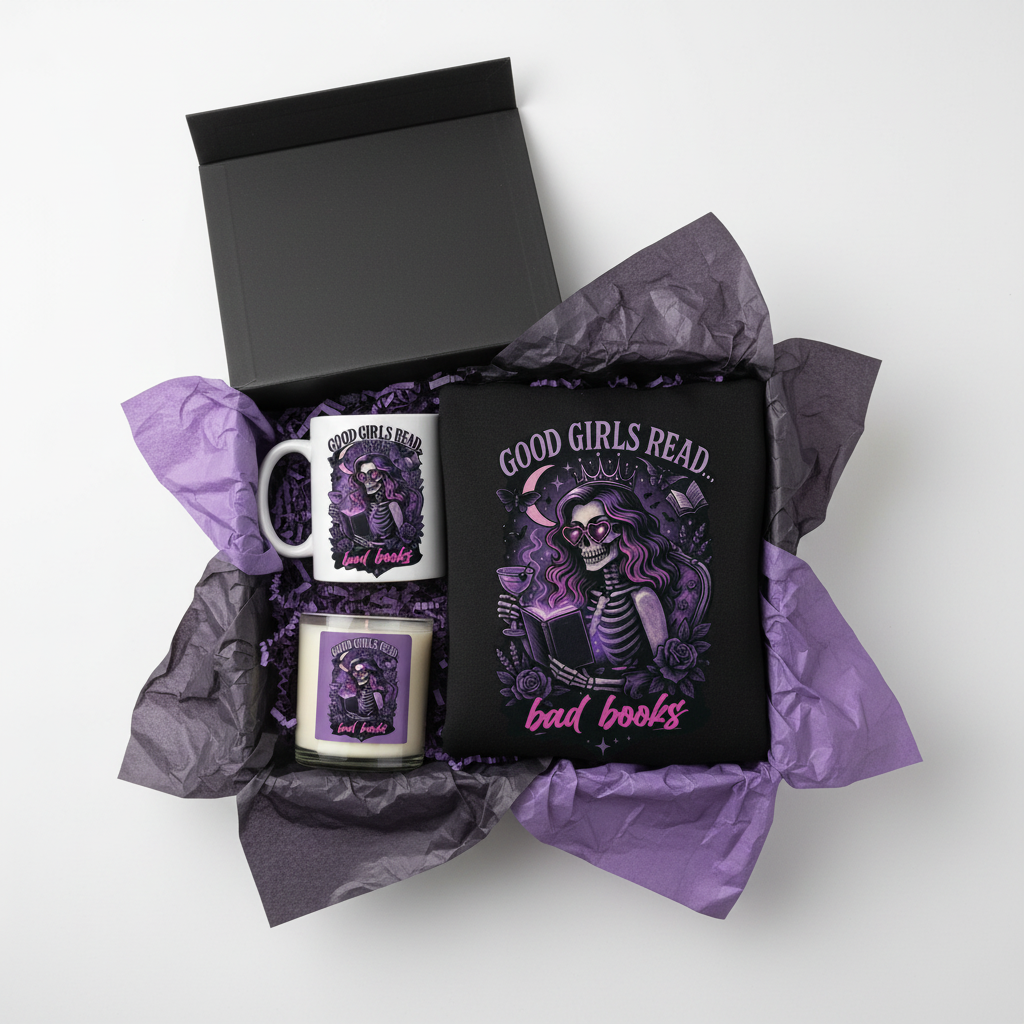 Gift set with 'Good Girls Read Bad Books' book and mugs in a black box with purple tissue paper.